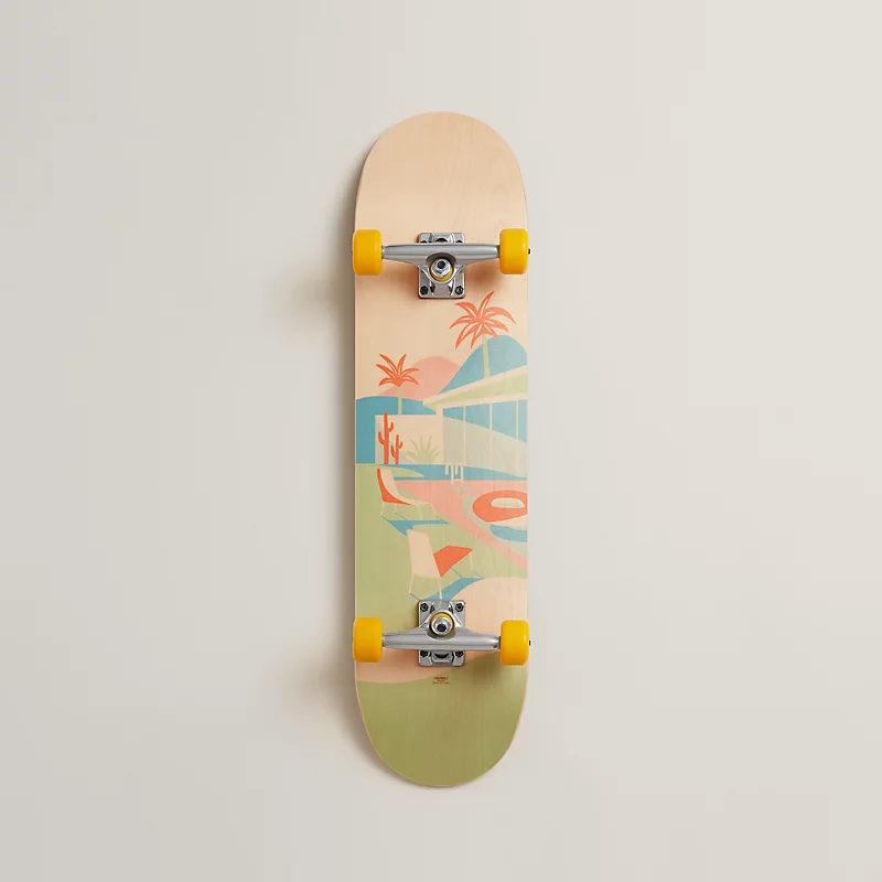 Pastel skateboard mounted against a neutral wall.